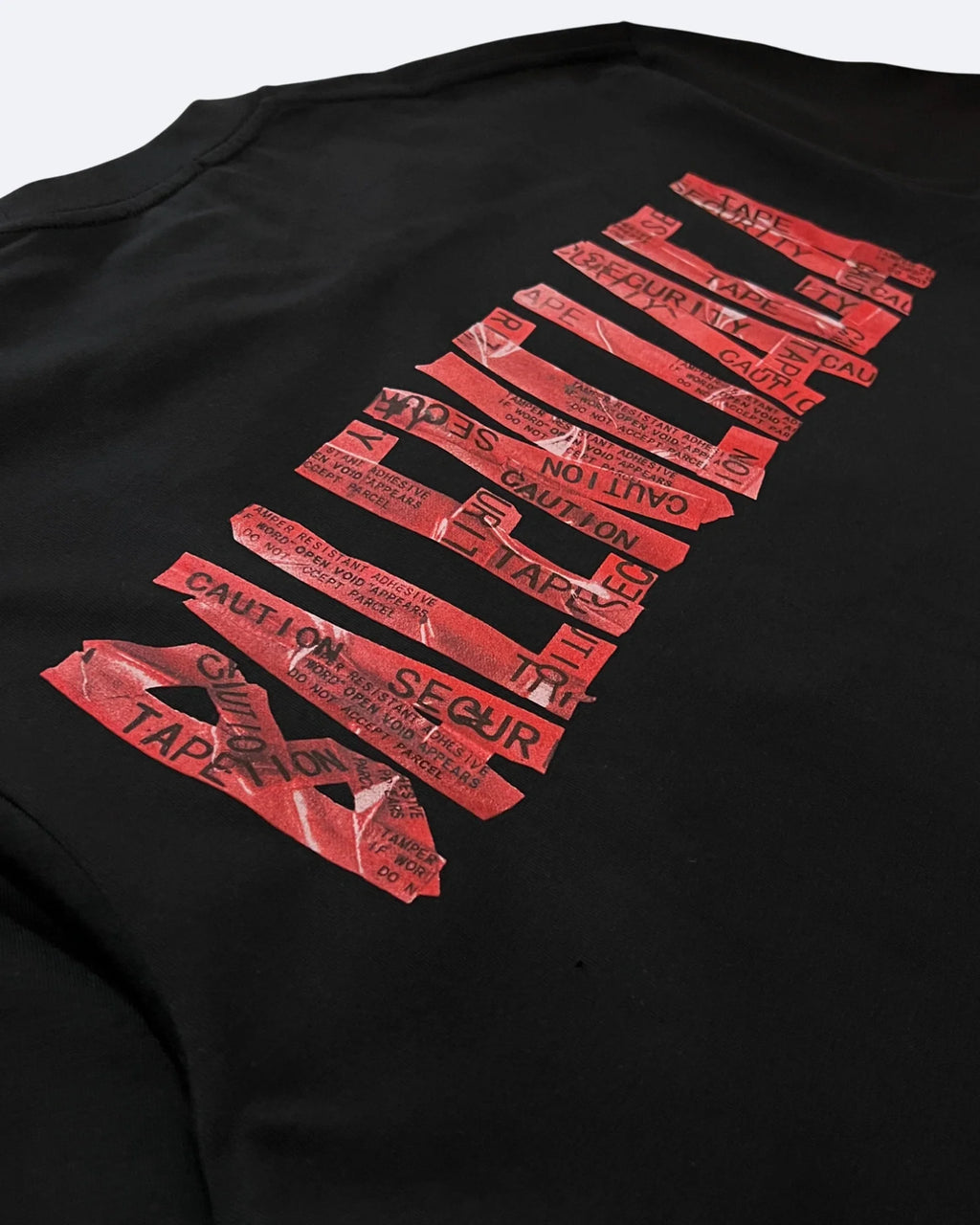 Balenciaga - červené tričko s výstražnou páskou - černé