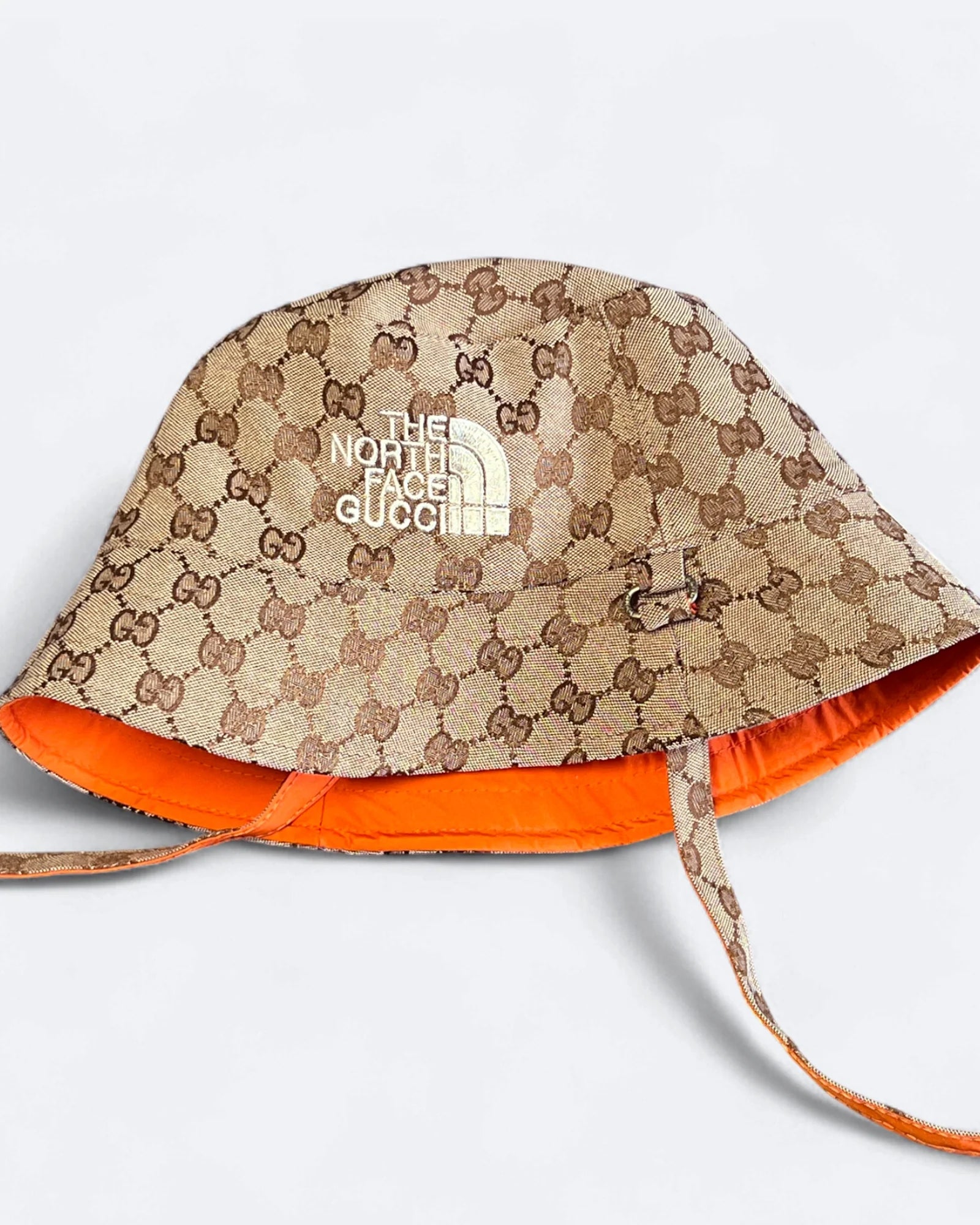 GC x The North Face – Oboustranný klobouk typu „bucket hat“ GG – béžová/oranžová