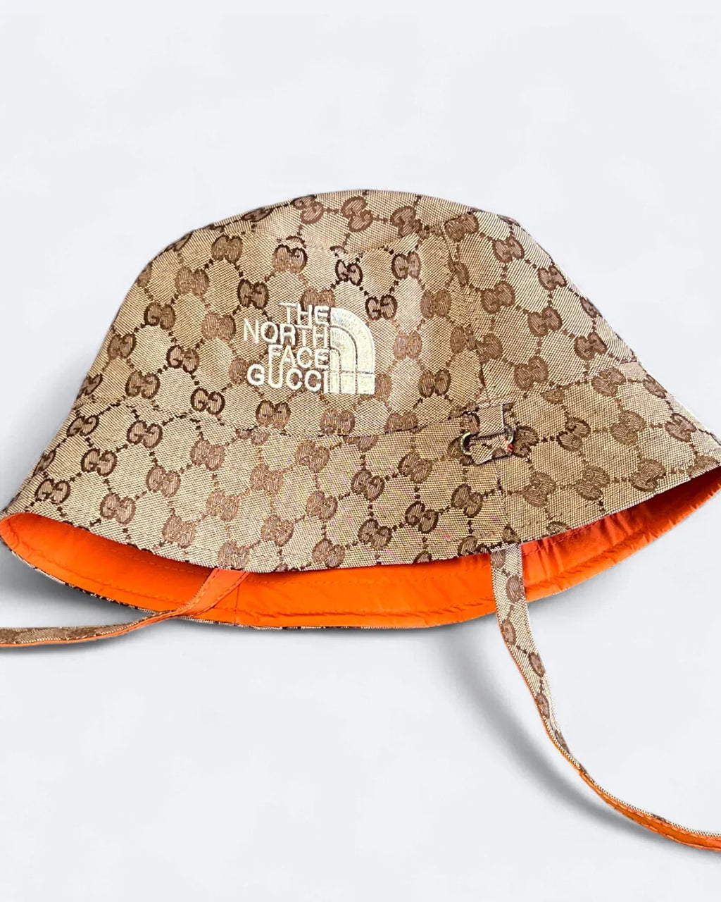 GC x The North Face – Oboustranný klobouk typu „bucket hat“ GG – béžová/oranžová