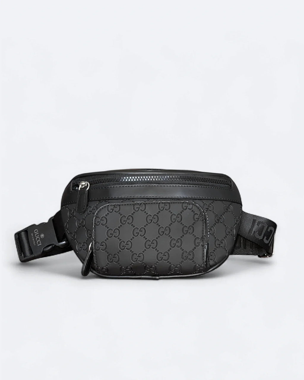 Gucci - Reliéfní crossbody kabelka GG Canvas - černá