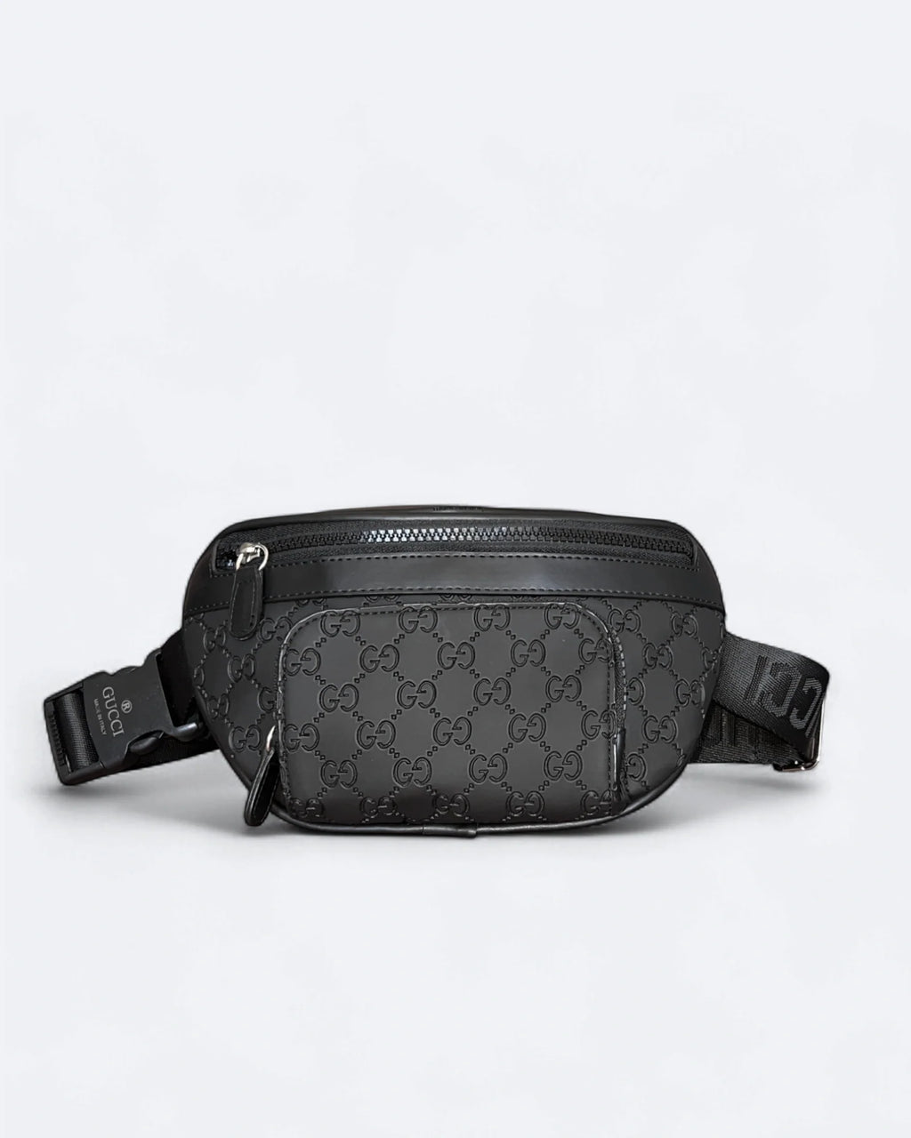 Gucci - Reliéfní crossbody kabelka GG Canvas - černá