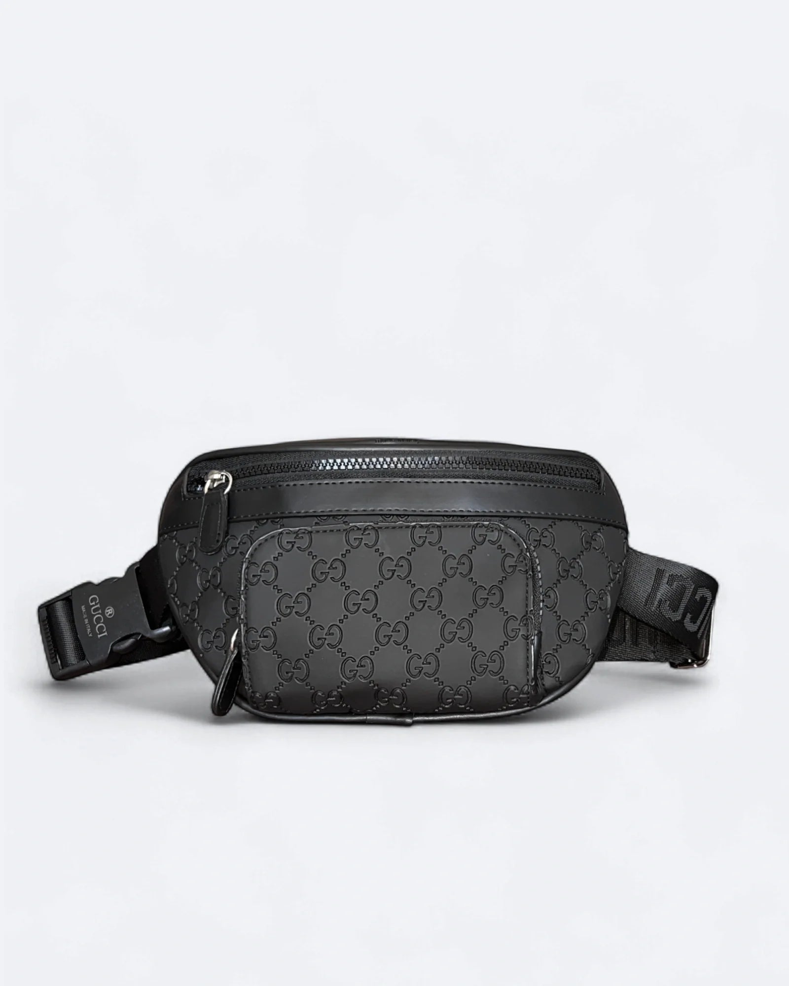 Gucci - Reliéfní crossbody kabelka GG Canvas - černá