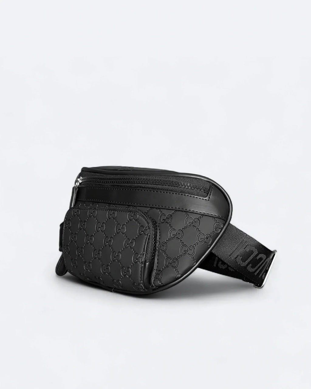 Gucci - Reliéfní crossbody kabelka GG Canvas - černá