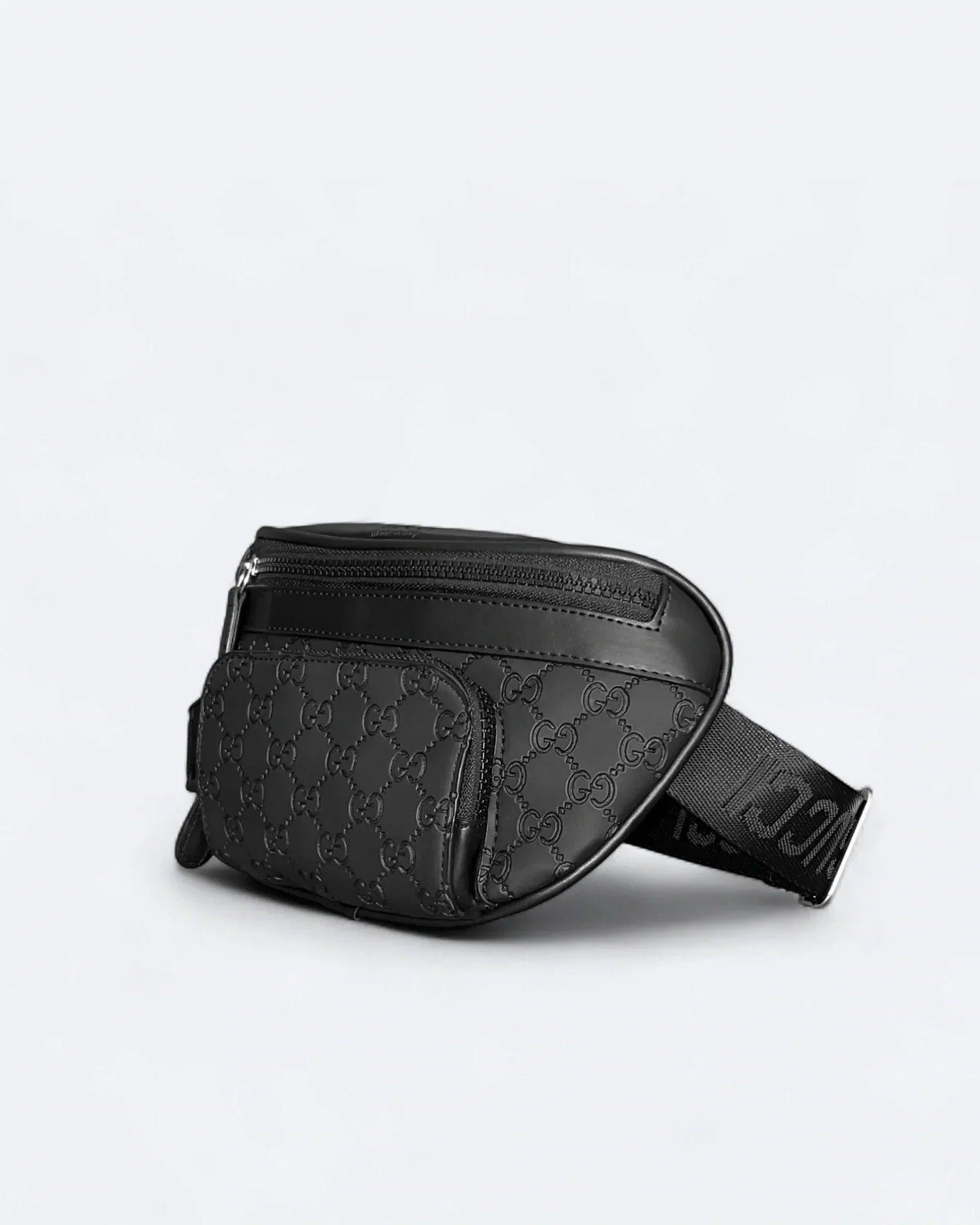 Gucci - Reliéfní crossbody kabelka GG Canvas - černá